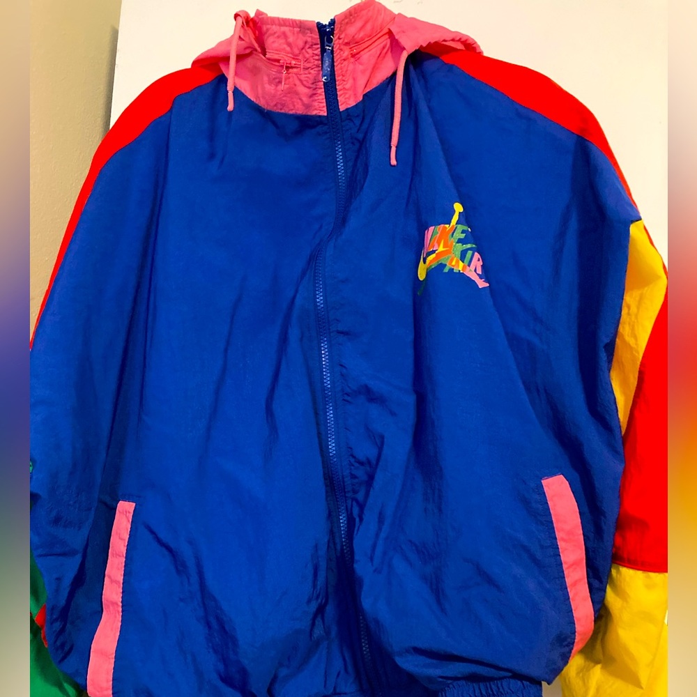 I’m selling a vintage multi colored windbreaker.